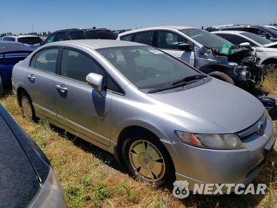 Czwarte zdjęcie samochodu z boku: 2006 HONDA CIVIC HYBRID VIN:JHMFA362X6S028689 - miniatura