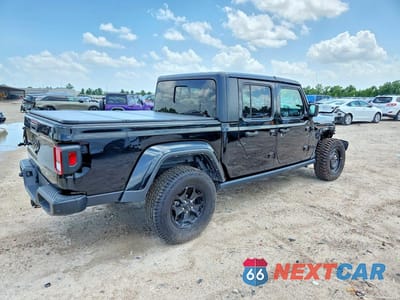 Trzecie zdjęcie samochodu z tyłu: 2023 JEEP GLADIATOR SPORT VIN:1C6HJTAG8PL506401 - miniatura