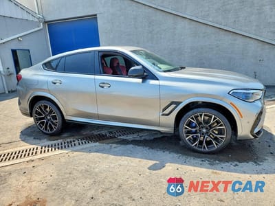 Czwarte zdjęcie samochodu z boku: 2021 BMW X6 M/M COMPETITION VIN:5YMCY0C01M9E19441 - miniatura