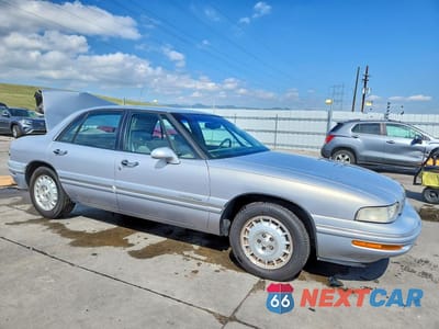Czwarte zdjęcie samochodu z boku: 1998 BUICK LESABRE LIMITED VIN:1G4HR52K7WH436001 - miniatura