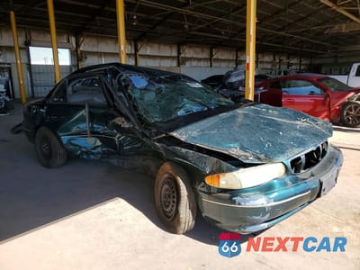 Czwarte zdjęcie samochodu z boku: 1999 BUICK CENTURY LIMITED VIN:2G4WY52M6X1430707 - miniatura