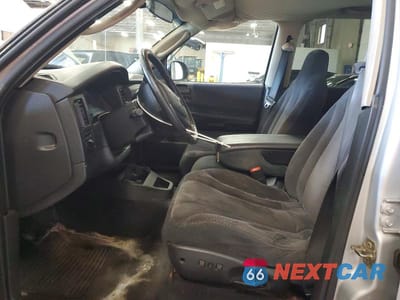 Zdjęcie 7 z 13 samochodu: 2004 DODGE DAKOTA QUAD SPORT VIN:1D7HG38N54S520064 - miniatura