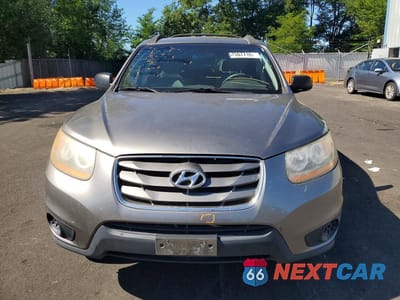 Piąte zdjęcie samochodu w środku: 2011 HYUNDAI SANTA FE GLS VIN:5XYZG4AG7BG080500 - miniatura