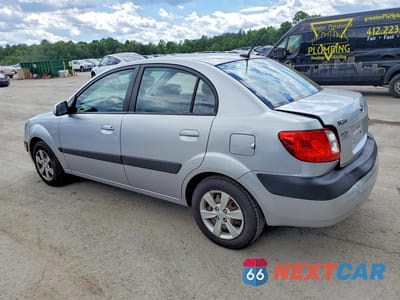 Drugie zdjęcie samochodu z przodu: 2009 KIA RIO BASE VIN:KNADE223796584619 - miniatura