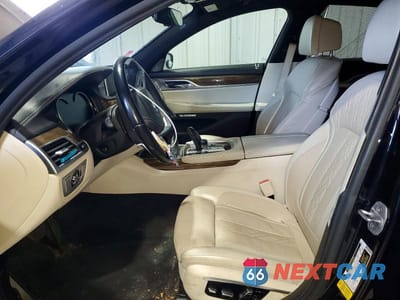 Zdjęcie 7 z 12 samochodu: 2016 BMW 740 I VIN:WBA7E2C58GG548104 - miniatura