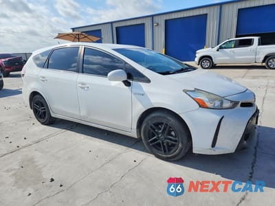 Czwarte zdjęcie samochodu z boku: 2016 TOYOTA PRIUS V TWO VIN:JTDZN3EU2GJ044124 - miniatura