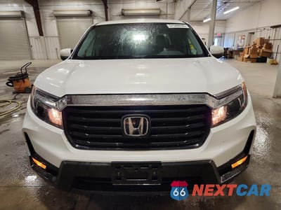 Piąte zdjęcie samochodu w środku: 2023 HONDA RIDGELINE RTL VIN:5FPYK3F53PB057748 - miniatura