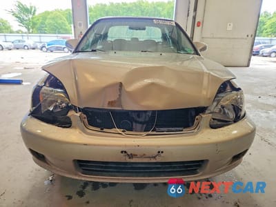 Piąte zdjęcie samochodu w środku: 2000 HONDA CIVIC EX VIN:1HGEJ8649YL042030 - miniatura