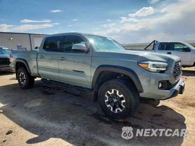 Czwarte zdjęcie samochodu z boku: 2023 TOYOTA TACOMA TRD OFF-ROAD VIN:3TYDZ5BN0PT034495 - miniatura
