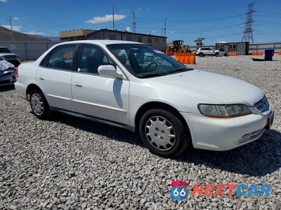 Czwarte zdjęcie samochodu z boku: 2001 HONDA ACCORD LX VIN:1HGCG56431A137625 - miniatura