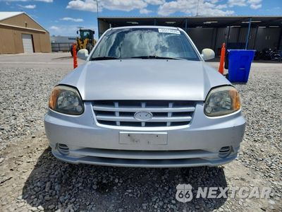 Piąte zdjęcie samochodu w środku: 2004 HYUNDAI ACCENT GL VIN:KMHCG45C64U553507 - miniatura