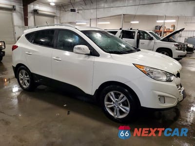 Czwarte zdjęcie samochodu z boku: 2013 HYUNDAI TUCSON GLS VIN:KM8JUCAC6DU604424 - miniatura