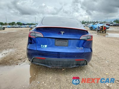 Zdjęcie 6 z 12 samochodu: 2024 TESLA MODEL Y VIN:7SAYGDEE5RA292429 - miniatura