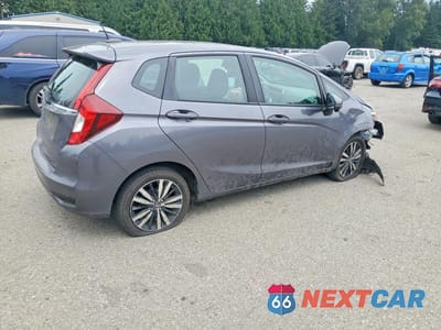 Trzecie zdjęcie samochodu z tyłu: 2019 HONDA FIT EX VIN:3HGGK5H86KM739908 - miniatura