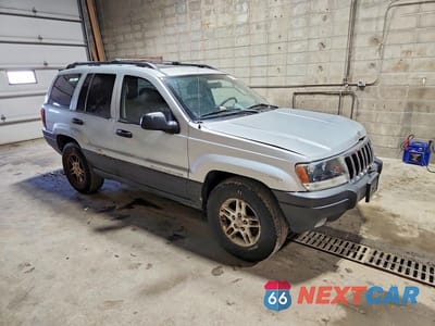 Czwarte zdjęcie samochodu z boku: 2003 JEEP GRAND CHEROKEE LAREDO VIN:1J4GW48S63C524597 - miniatura