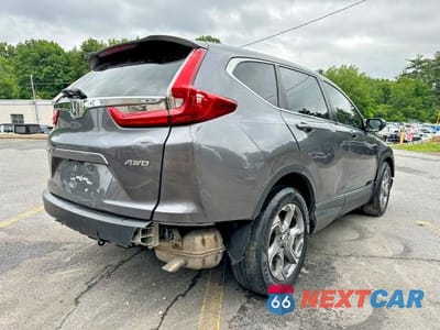Trzecie zdjęcie samochodu z tyłu: 2018 HONDA CR-V EXL VIN:2HKRW2H88JH656043 - miniatura