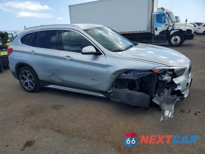 Czwarte zdjęcie samochodu z boku: 2018 BMW X1 SDRIVE28I VIN:WBXHU7C32J5H39726 - miniatura