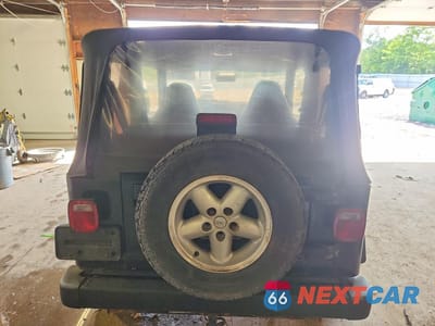 Zdjęcie 6 z 14 samochodu: 1999 JEEP WRANGLER / TJ SE VIN:1J4FY29P3XP466242 - miniatura