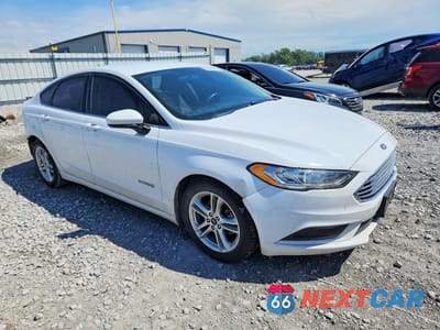 Czwarte zdjęcie samochodu z boku: 2018 FORD FUSION SE HYBRID VIN:3FA6P0LU2JR235110 - miniatura
