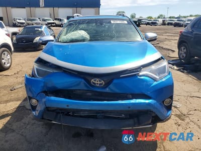 Piąte zdjęcie samochodu w środku: 2016 TOYOTA RAV4 HV XLE VIN:JTMRJREVXGD057306 - miniatura