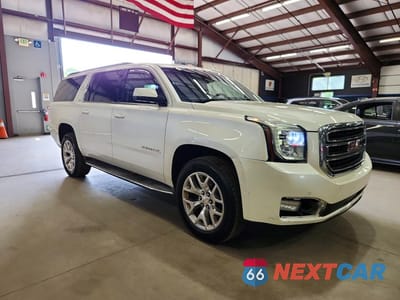 Czwarte zdjęcie samochodu z boku: 2015 GMC YUKON XL K1500 SLT VIN:1GKS2HKC4FR531199 - miniatura