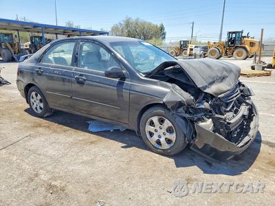 Czwarte zdjęcie samochodu z boku: 2004 KIA SPECTRA LX VIN:KNAFE121045042567 - miniatura