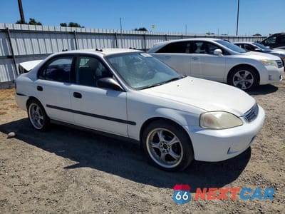 Czwarte zdjęcie samochodu z boku: 1999 HONDA CIVIC LX VIN:1HGEJ6675XL054267 - miniatura
