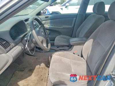 Zdjęcie 7 z 12 samochodu: 2002 TOYOTA CAMRY LE VIN:4T1BE32K92U091612 - miniatura