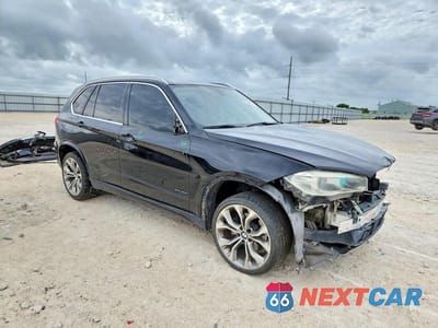 Czwarte zdjęcie samochodu z boku: 2014 BMW X5 VIN:5UXKR0C50E0K49586 - miniatura