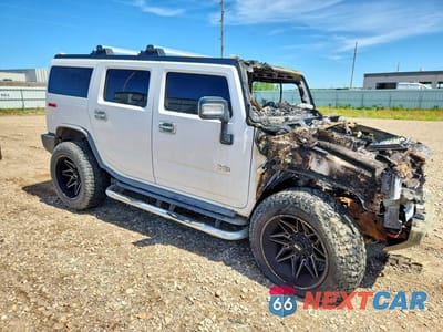 Czwarte zdjęcie samochodu z boku: 2006 HUMMER H2 VIN:5GRGN23U66H103121 - miniatura