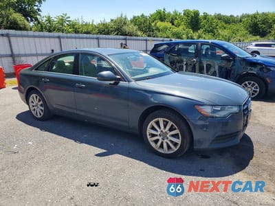 Czwarte zdjęcie samochodu z boku: 2014 AUDI A6 PREMIUM PLUS VIN:WAUGFAFC4EN050881 - miniatura