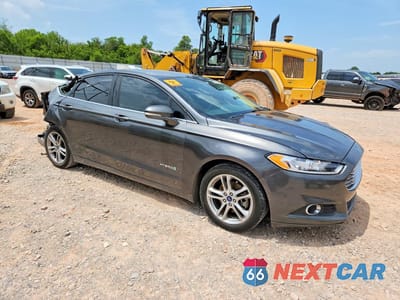 Czwarte zdjęcie samochodu z boku: 2016 FORD FUSION SE HYBRID VIN:3FA6P0LU1GR195076 - miniatura