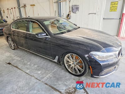Czwarte zdjęcie samochodu z boku: 2016 BMW 750 XI VIN:WBA7F2C51GG419523 - miniatura