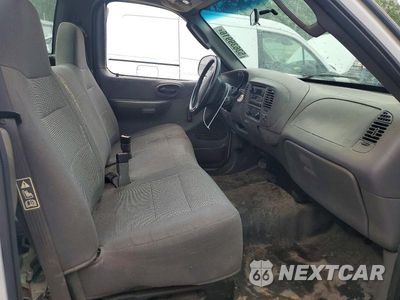 Zdjęcie 10 z 12 samochodu: 2003 FORD F150 VIN:1FTRF17273NB75744 - miniatura