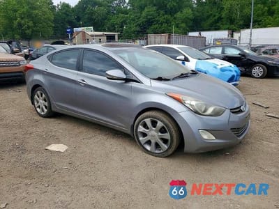 Czwarte zdjęcie samochodu z boku: 2012 HYUNDAI ELANTRA LIMITED VIN:KMHDH4AEXCU351454 - miniatura