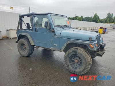 Czwarte zdjęcie samochodu z boku: 1998 JEEP WRANGLER / TJ SPORT VIN:1J4FY19S2WP739281 - miniatura