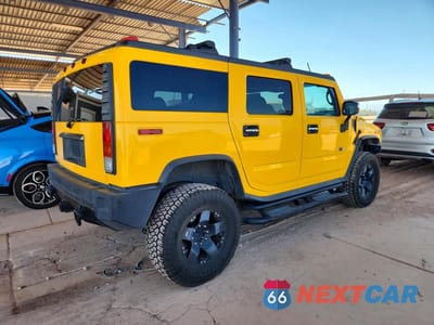 Trzecie zdjęcie samochodu z tyłu: 2003 HUMMER H2 VIN:5GRGN23U03H132738 - miniatura