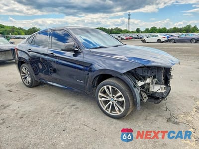 Czwarte zdjęcie samochodu z boku: 2015 BMW X6 XDRIVE35I VIN:5UXKU2C55F0F94823 - miniatura