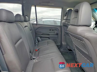 Zdjęcie 11 z 14 samochodu: 2003 HONDA PILOT EXL VIN:2HKYF18573H555218 - miniatura