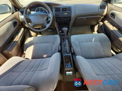 Zdjęcie 8 z 12 samochodu: 1997 TOYOTA COROLLA BASE VIN:2T1BA02EXVC176906 - miniatura