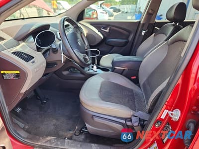 Zdjęcie 7 z 13 samochodu: 2013 HYUNDAI TUCSON GLS VIN:KM8JU3ACXDU691115 - miniatura