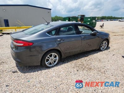 Trzecie zdjęcie samochodu z tyłu: 2018 FORD FUSION SE VIN:3FA6P0HD7JR200927 - miniatura