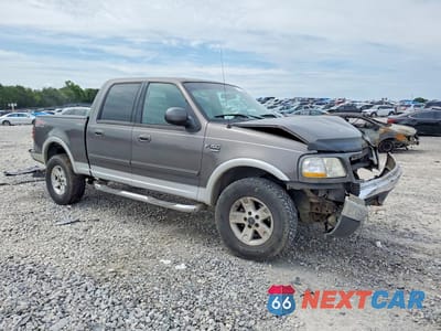 Czwarte zdjęcie samochodu z boku: 2002 FORD F150 SUPERCREW VIN:1FTRW08L62KC68854 - miniatura