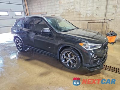 Czwarte zdjęcie samochodu z boku: 2016 BMW X1 XDRIVE28I VIN:WBXHT3C36GP884175 - miniatura