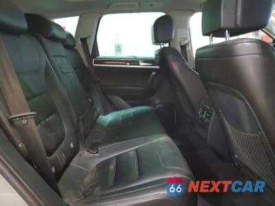 Zdjęcie 11 z 14 samochodu: 2011 VOLKSWAGEN TOUAREG HYBRID VIN:WVGFG9BP1BD004991 - miniatura
