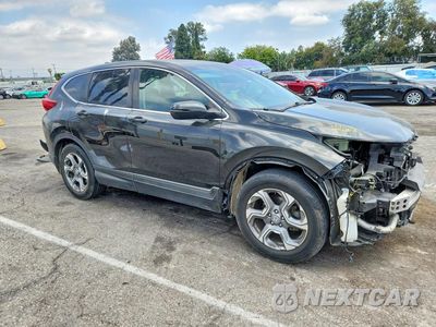 Czwarte zdjęcie samochodu z boku: 2018 HONDA CR-V EXL VIN:2HKRW1H88JH522241 - miniatura