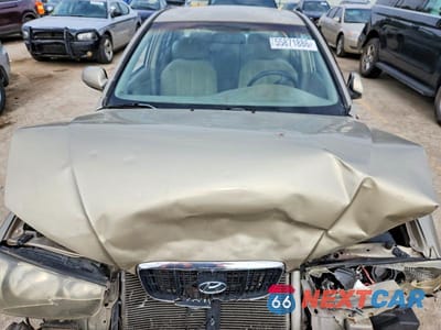 Zdjęcie 11 z 12 samochodu: 2003 HYUNDAI ELANTRA GLS VIN:KMHDN45D83U473840 - miniatura