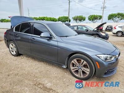 Czwarte zdjęcie samochodu z boku: 2018 BMW 330 I VIN:WBA8B9G53JNU58071 - miniatura