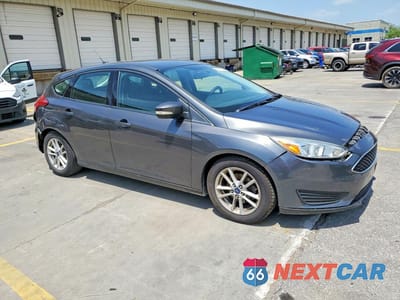 Czwarte zdjęcie samochodu z boku: 2016 FORD FOCUS SE VIN:1FADP3K27GL358773 - miniatura