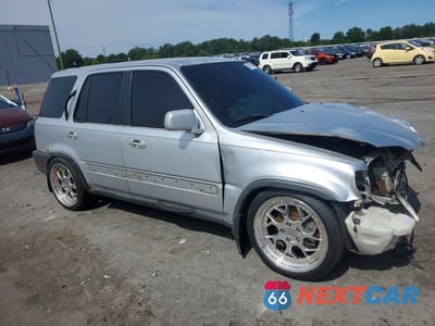 Czwarte zdjęcie samochodu z boku: 1999 HONDA CRV VIN:JHLRD1866XC013759 - miniatura